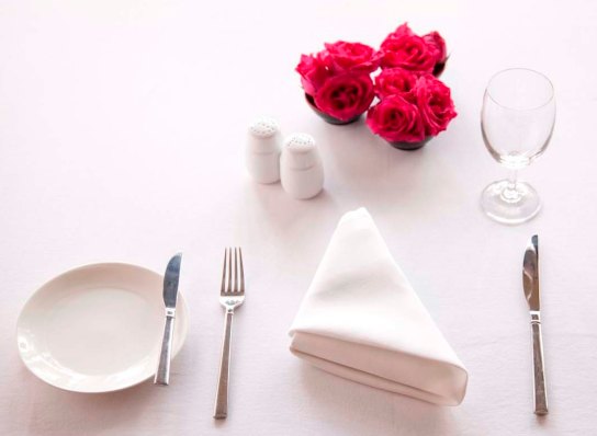 The Standard Table Cover includes appointments like the centerpiece, salt and pepper shakers, an an ashtray (for smoking areas).