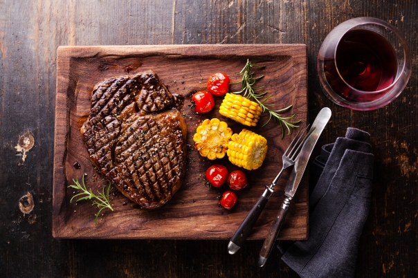 Savour Australia at New World Hotel. Enjoy this medium rare grilled Steak Ribeye with corn and cherry tomatoes—